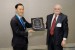 Dr. Nagib Callaos receiving from Prof. Shigehiro Hashimoto, on behalf of Prof. Matthew E. Edwards, the "2018 William G. Lesso Memorial Award for Excellence in Engineering."